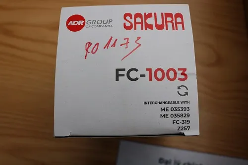 Lọc nhiên liệu xe nâng Sakura FC-1003 nhìn mặt bên in thông tin