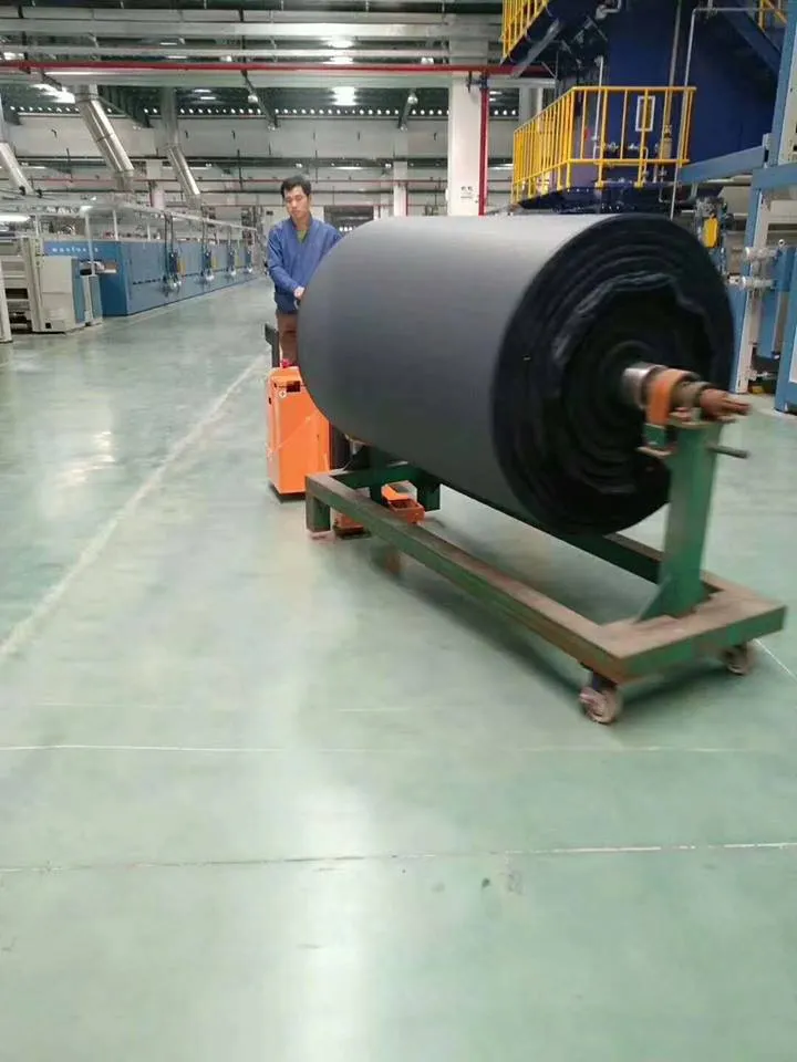Xe kéo điện Zowell XTB — kéo xe goòng chở cuộn vật liệu