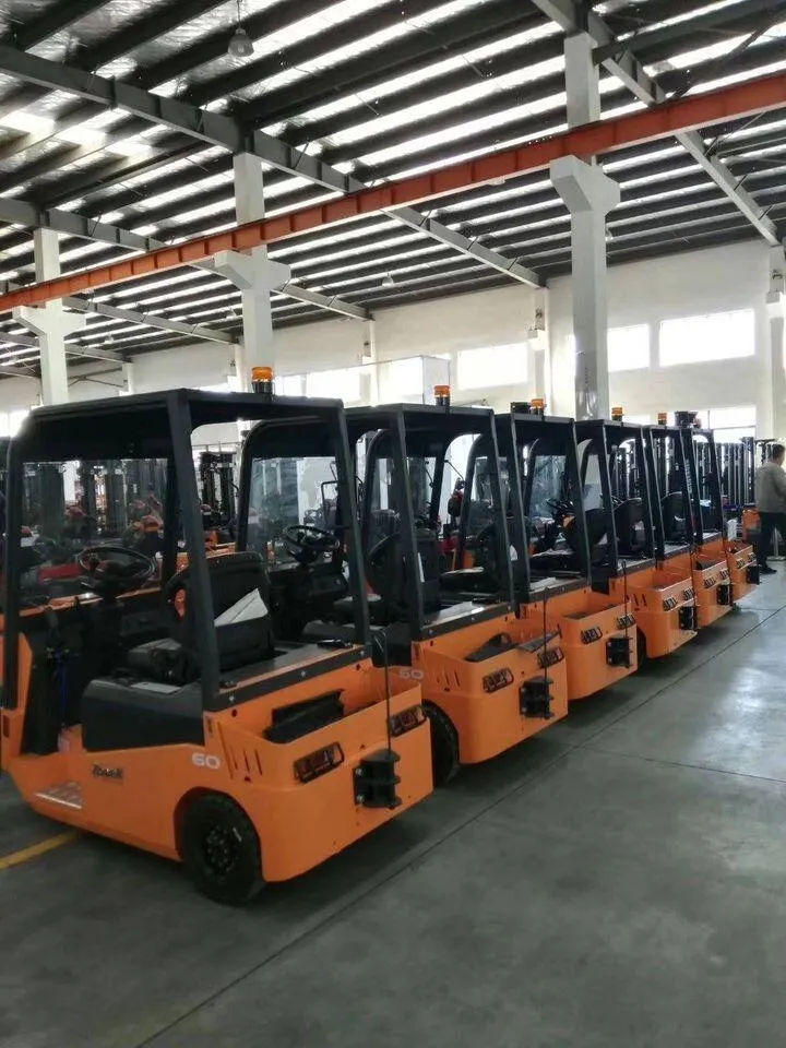 Xe kéo điện Zowell XTH60 — lô xe bản cabin kín tại xưởng hãng